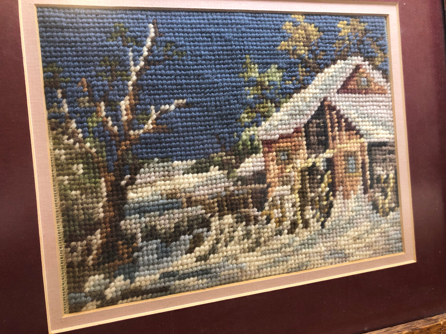 Wood framed yarn art "Snowy Cabin"